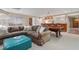 Finished basement area with pool table, lounge area, bar and an ottoman at 400 Fieldstone Lndg, Alpharetta, GA 30005