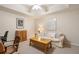 Cozy basement office space featuring a sofa, wood desk, and decor at 400 Fieldstone Lndg, Alpharetta, GA 30005