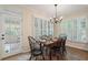 Inviting eat-in kitchen area that's flooded with natural light from large windows at 400 Fieldstone Lndg, Alpharetta, GA 30005