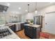 Stylish kitchen featuring granite countertops, stainless steel appliances, and a center island at 400 Fieldstone Lndg, Alpharetta, GA 30005