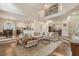 Open floorplan with spacious living room flowing into kitchen and dining areas at 400 Fieldstone Lndg, Alpharetta, GA 30005