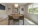 Elegant dining room featuring a chandelier, built-in shelving, and stylish decor at 4274 Revere Cir, Marietta, GA 30062