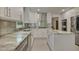 Spacious kitchen with white cabinets, stainless steel appliances, and granite countertops at 4274 Revere Cir, Marietta, GA 30062