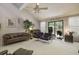 Inviting living room featuring a ceiling fan, vaulted ceilings, and ample seating at 4274 Revere Cir, Marietta, GA 30062