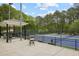 Inviting community tennis court with a gazebo and seating area perfect for relaxing and socializing at 4274 Revere Cir, Marietta, GA 30062