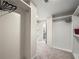Spacious walk-in closet with ample shelving and hanging space for organization at 6615 Callanwalde Ct, Suwanee, GA 30024