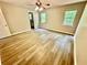 Large bedroom with neutral colors, wood flooring, ceiling fan, and dual windows at 75 Davis Mill Dr, Dallas, GA 30157