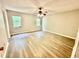 Spacious bedroom with wood floors, large windows, and a ceiling fan at 75 Davis Mill Dr, Dallas, GA 30157
