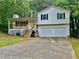 A charming home with a two-car garage and inviting front porch at 75 Davis Mill Dr, Dallas, GA 30157