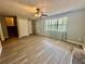 Spacious living area with modern flooring, a window, and easy access to the upper floors at 75 Davis Mill Dr, Dallas, GA 30157