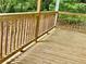 A close up of the porch, featuring railings and floorboards at 75 Davis Mill Dr, Dallas, GA 30157