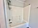 Bathroom shower featuring chrome fixtures and a built-in soap rack at 75 Davis Mill Dr, Dallas, GA 30157