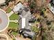 Overhead shot of property with manicured lawn, playset, and outdoor seating areas at 810 Kenry Ct, Atlanta, GA 30342