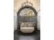 Elegant bathroom featuring a soaking tub, dual shower heads, and herringbone tile floors at 810 Kenry Ct, Atlanta, GA 30342