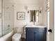 Stylish bathroom with subway tile shower, modern vanity, and sleek fixtures, blending functionality with a contemporary design at 810 Kenry Ct, Atlanta, GA 30342