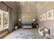 Charming Bedroom with vaulted ceiling, cute wall decor, soft lighting, and plush rug, creating a warm, inviting space at 810 Kenry Ct, Atlanta, GA 30342