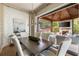 Spacious dining room seamlessly transitions to outdoor space, creating an inviting and airy atmosphere at 810 Kenry Ct, Atlanta, GA 30342