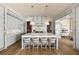 Spacious kitchen featuring a marble island with seating, complemented by modern appliances and open layout at 810 Kenry Ct, Atlanta, GA 30342