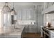 Gourmet kitchen boasting premium appliances, a spacious marble island, and elegant cabinetry at 810 Kenry Ct, Atlanta, GA 30342