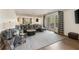 Spacious living room with shiplap walls, hardwood floors, and a comfortable sectional sofa at 810 Kenry Ct, Atlanta, GA 30342