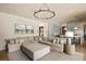 Spacious living room with a sectional sofa offers a seamless transition to the kitchen area for modern living at 810 Kenry Ct, Atlanta, GA 30342