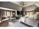 Spacious main bedroom with sitting area, neutral tones, ample natural light, creating a tranquil retreat at 810 Kenry Ct, Atlanta, GA 30342
