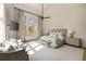 Spacious main bedroom with large windows, a seating area, and neutral tones at 810 Kenry Ct, Atlanta, GA 30342