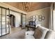 Elegant office with sliding glass doors, stylish ceiling detail, and curated decor, creating a sophisticated workspace at 810 Kenry Ct, Atlanta, GA 30342