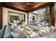 Inviting outdoor living space with a fireplace, grill, dining, and play area is perfect for entertaining at 810 Kenry Ct, Atlanta, GA 30342