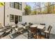 Cozy outdoor patio featuring ample seating and a charming gravel ground cover at 810 Kenry Ct, Atlanta, GA 30342