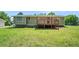Backyard of home with deck at 898 Doeskin Nw Dr, Conyers, GA 30012