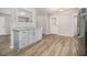 Stylish kitchen with stainless steel appliances, countertop space, and ample cabinet storage at 898 Doeskin Nw Dr, Conyers, GA 30012