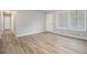 Cozy living area with new flooring, neutral wall paint, and great natural light at 898 Doeskin Nw Dr, Conyers, GA 30012