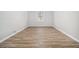Inviting living room features ample natural light and contemporary wood-look flooring, ideal for a cozy atmosphere at 898 Doeskin Nw Dr, Conyers, GA 30012