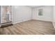 Bright, spacious living room with durable floors, neutral walls, and natural light at 898 Doeskin Nw Dr, Conyers, GA 30012