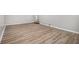 Well-lit living room with modern vinyl flooring, complemented by fresh neutral paint, creating a welcoming space at 898 Doeskin Nw Dr, Conyers, GA 30012