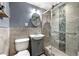 Modern bathroom featuring stylish tile work, a glass-enclosed shower, and vanity at 215 Piedmont Ne Ave # 1509, Atlanta, GA 30308