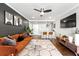 Charming living room boasts stylish decor, a ceiling fan, and an adjacent bar area at 215 Piedmont Ne Ave # 1509, Atlanta, GA 30308