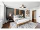 Luxurious main bedroom boasts stylish accent wall, modern furnishings, and ambient lighting at 215 Piedmont Ne Ave # 1509, Atlanta, GA 30308