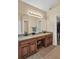 Bathroom features double sink vanity with granite countertop at 2810 Olde Town Park Dr, Norcross, GA 30071