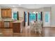Breakfast nook with wooded view and access to the backyard deck at 2810 Olde Town Park Dr, Norcross, GA 30071