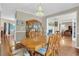 Elegant dining room showcasing hardwood floors, chandelier lighting, and an open layout at 2810 Olde Town Park Dr, Norcross, GA 30071