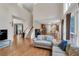 Open concept floor plan boasts natural light and beautiful hardwood flooring at 2810 Olde Town Park Dr, Norcross, GA 30071