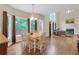 Light filled living room with hardwood floors and a fireplace at 2810 Olde Town Park Dr, Norcross, GA 30071