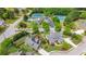 Aerial shot of a well-landscaped house, green lawns and community amenities at 3425 Sweet Basil Ln, Loganville, GA 30052