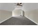 This bedroom features neutral colors, carpeted floor, and a doorway at 3425 Sweet Basil Ln, Loganville, GA 30052