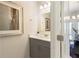 Powder room featuring white walls and a gray vanity at 3808 Jack Vernon Cir, Powder Springs, GA 30127
