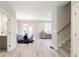 Dining area with a glass table, hardwood floors, and a modern chandelier at 3808 Jack Vernon Cir, Powder Springs, GA 30127