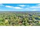 An aerial view shows lush trees surrounding the neighborhood with a location pin identifying the home at 3951 Lindley Dr, Powder Springs, GA 30127