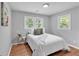 Bright bedroom with a single window and hardwood flooring providing comfort and style at 3951 Lindley Dr, Powder Springs, GA 30127